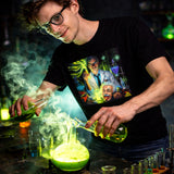 Person in a black t-shirt with a science-themed design conducting a chemical experiment.