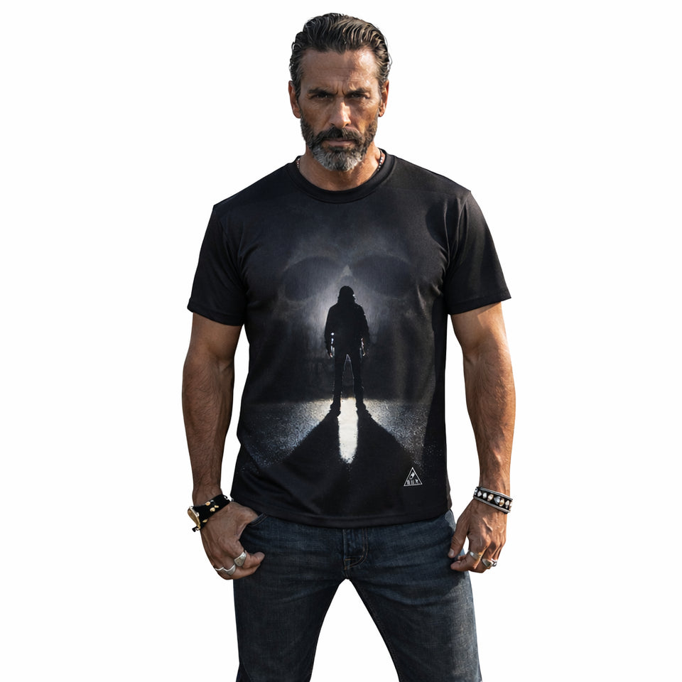 Man wearing a black t-shirt with a graphic design on a white background