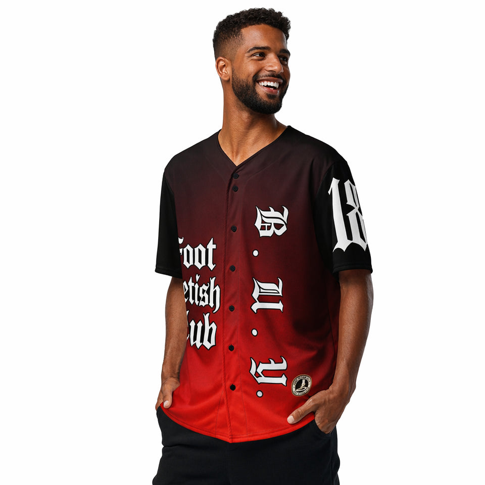 Man wearing a red and black baseball jersey with text on a white background