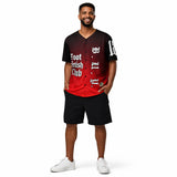 Man wearing a red and black baseball jersey with text on a white background